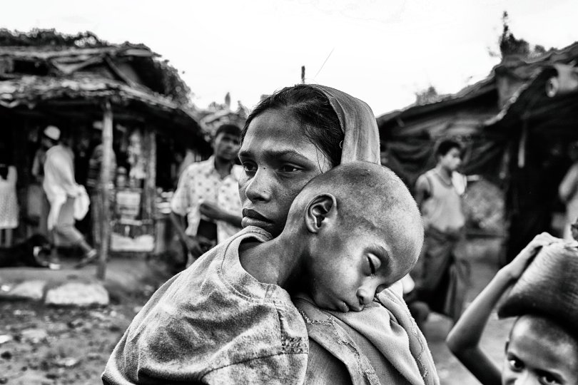 © Mohammad Rakibul Hasan A Rohingya mother takes her child to a medical camp. The recent influx of Rohingya refugees in Bangladesh has increased the risk factor for NTDs in Bangladesh; especially kala-azar, lymphatic filariasis and dengue.