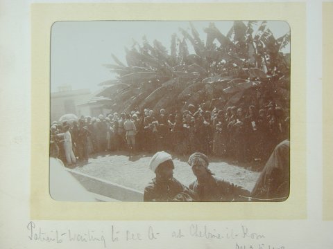Patients waiting to be seen. Note police guards. Chebine el Kom, 1903 Patients waiting to be seen. Note police guards. Chebine el Kom, 1903