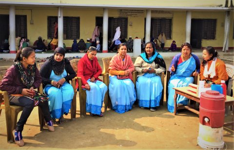 Female Community Health Volunteers (FCHVs) gathered to plan for a community health campaign. Photo: HERD International